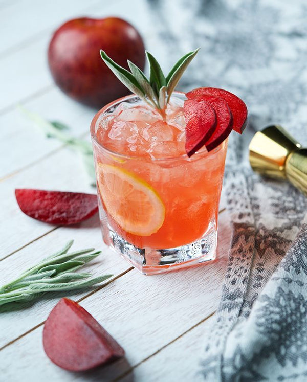 Citrus and Whiskey Mocktail with Plums and Sage